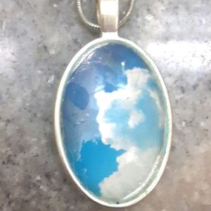 Life like Cloud print oval necklace. 16" metal snake chain.
